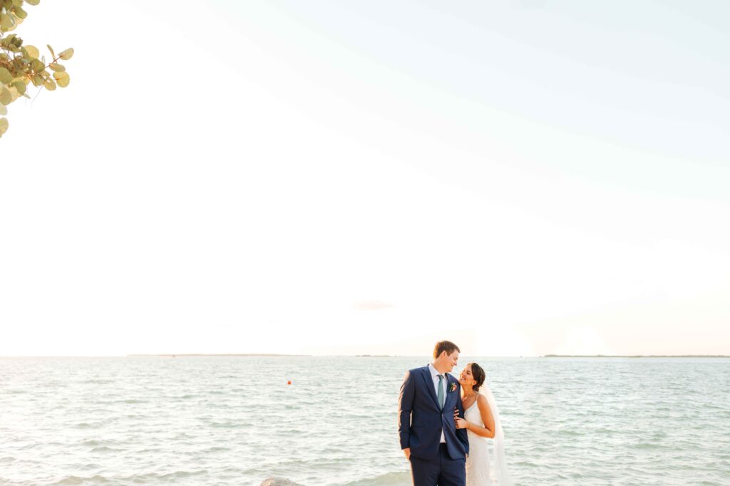 Newlywed couple on the beach at their Playa Largo wedding.