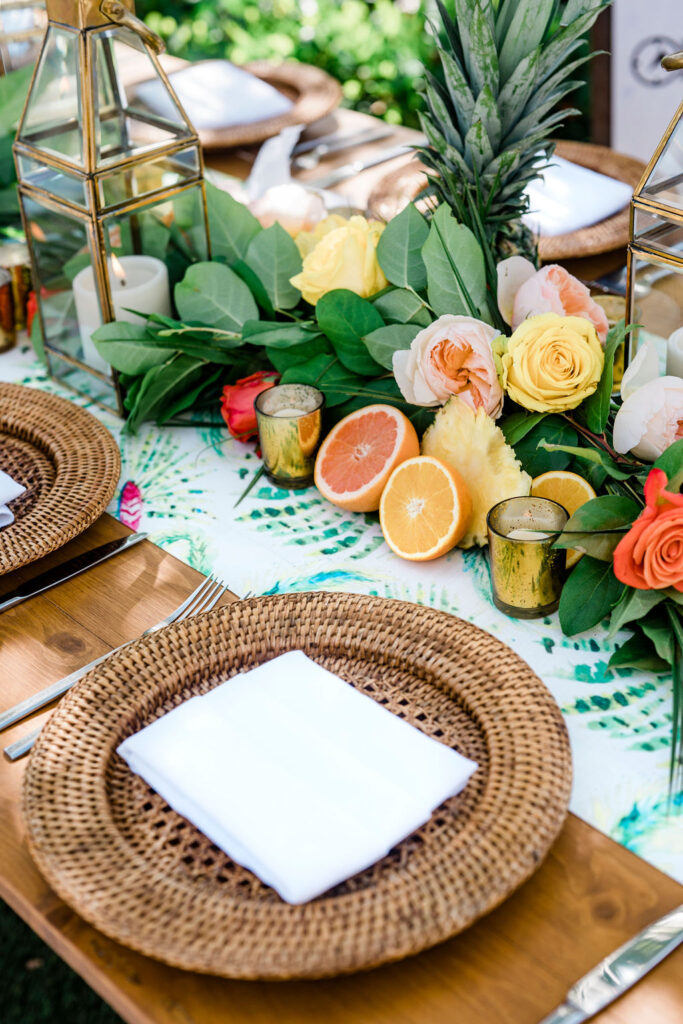 A wedding reception table with tropical decor at The Perry Hotel in Key West