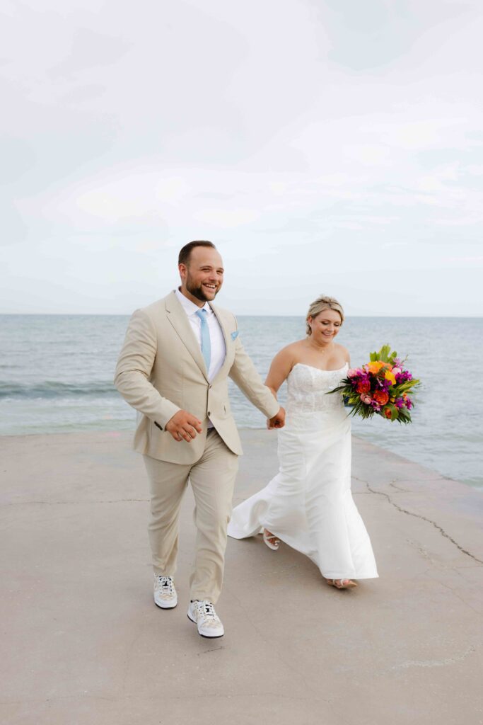 A bride and groom by the water at their Key West Elopement