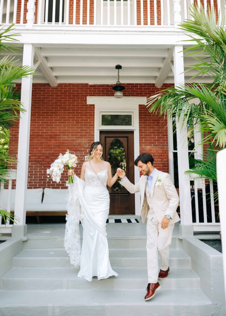A bride and groom at their Key West garden wedding at The Audubon House and Gardens.