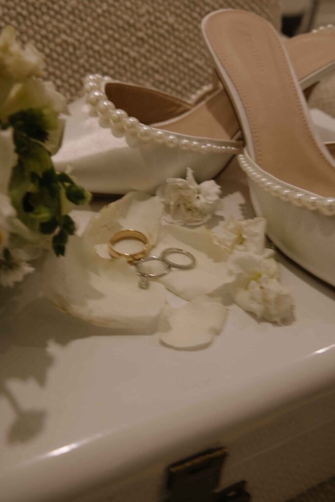 Shoes, rings, and detail photos at this Hotel Zamora wedding.
